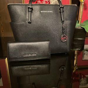 Black Michael kors purse with black wallet